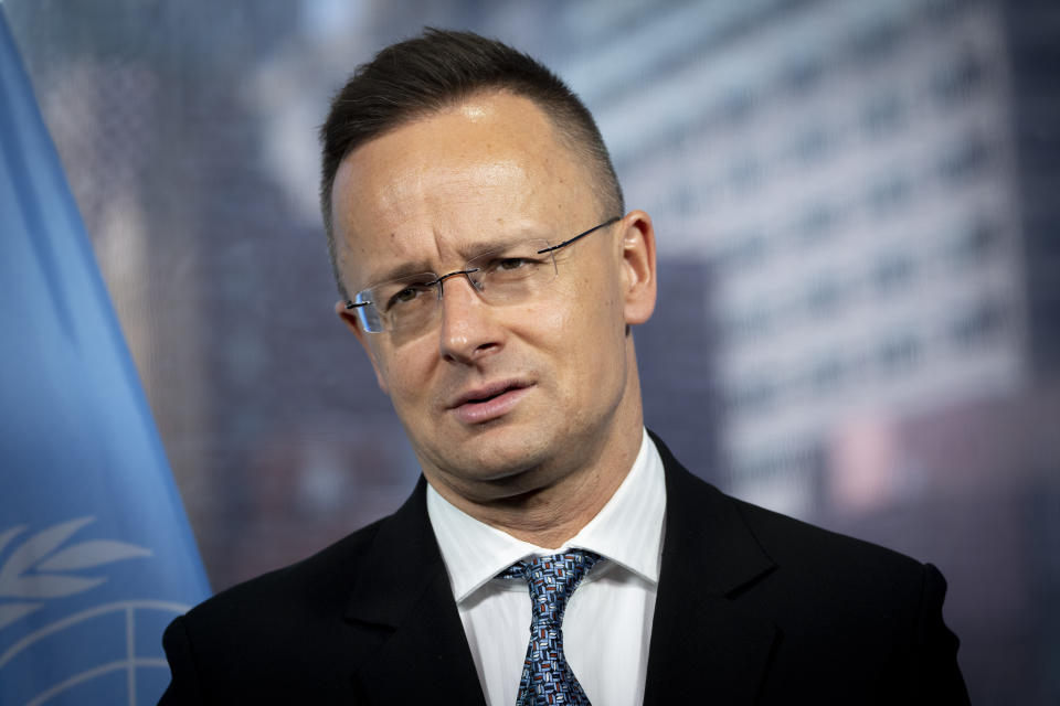 Peter Szijjarto, Minister of Foreign Affairs of Hungary, is interviewed by The Associated Press, Friday, March 24, 2023, at United Nations headquarters. Szijjarto said Friday that his country has not voted on whether to allow Finland and Sweden to join NATO because Hungarian lawmakers are sick of those countries' critiques of Hungarian domestic affairs. (AP Photo/John Minchillo)