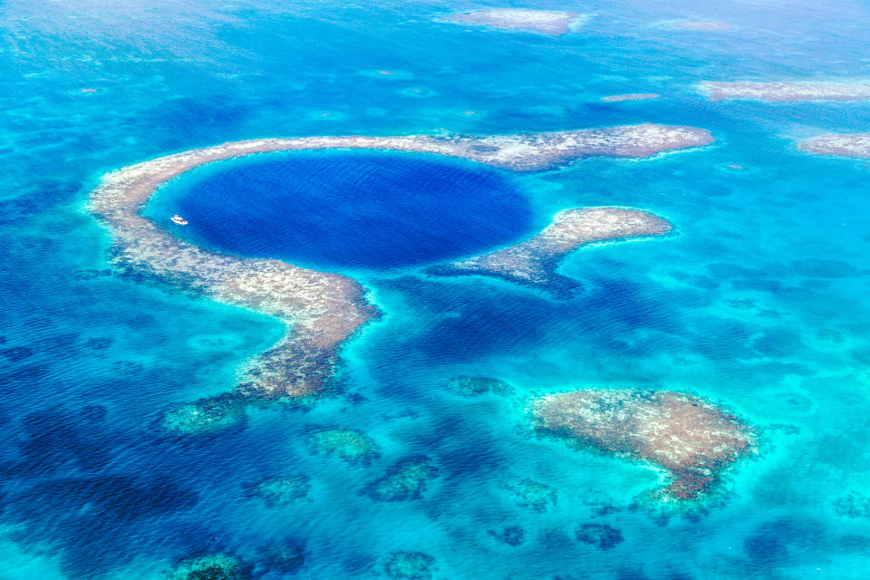 Plastic bottles lie at the bottom of o<span>ne of the world’s largest sinkholes The Great Blue Hole, in Belize on the Caribbean sea. </span>Source: Getty