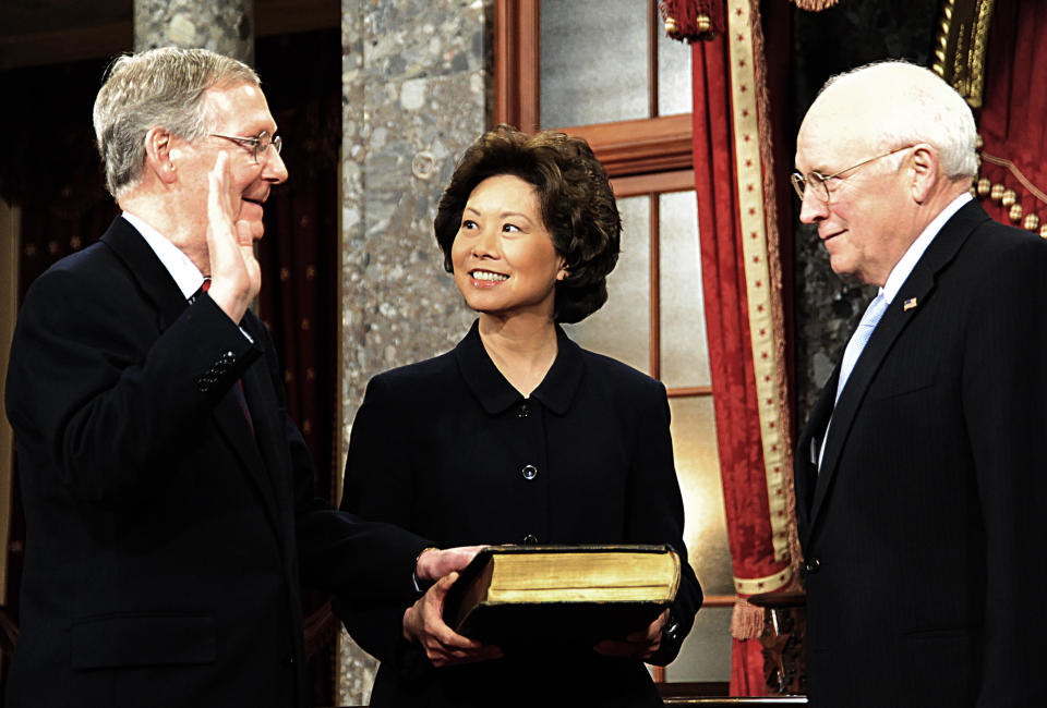 McConnell is sworn in by Vice President Dick Cheney as his wife Labor Secretary Elaine Chao holds the Bible during a swearing in  reenactment ceremony at the US Capitol Jan. 6, 2009. (KAREN BLEIER/AFP/Getty Images)
