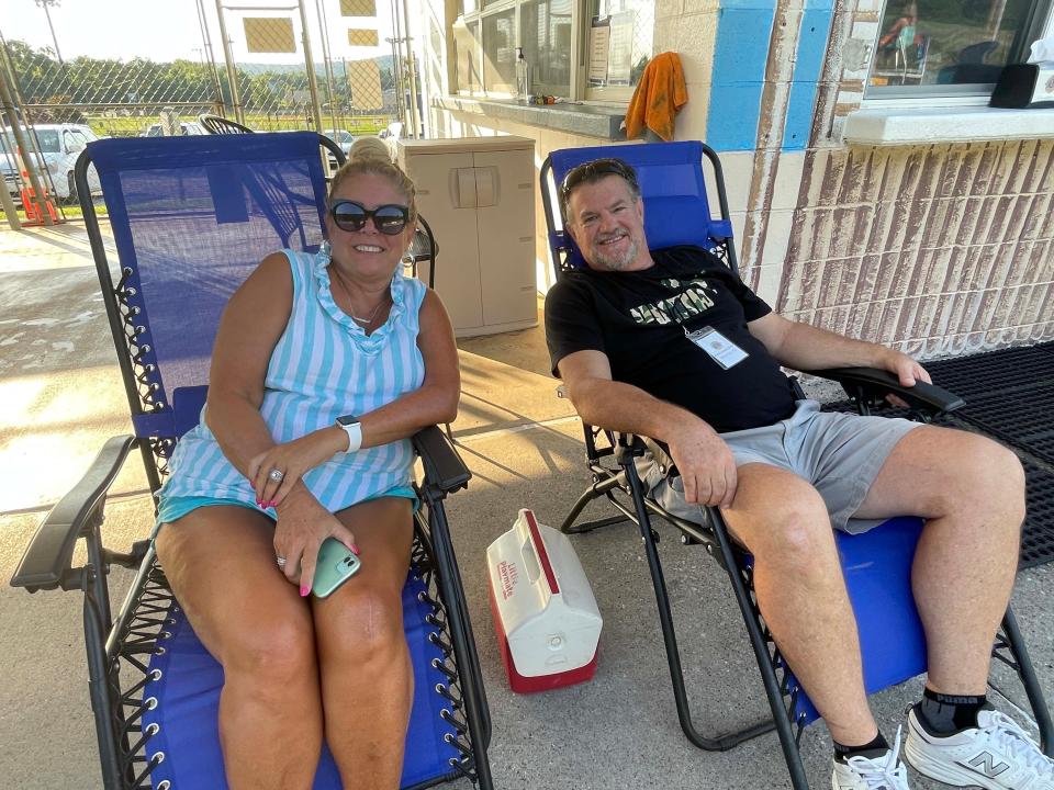 Lions Teresa and Martin Gillenwaters enjoy the shade at the summer pool party hosted by Beaver Ridge United Methodist Church held at the Karns Lions Club Community Pool Saturday, July 16, 2022.