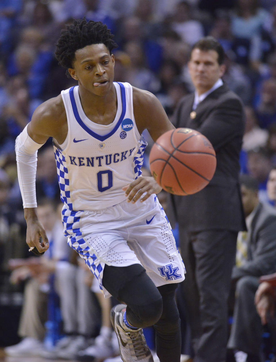 Kentucky guard De'Aaron Fox moves down court against UCLA in the second half of an NCAA college basketball tournament South Regional semifinal game Friday, March 24, 2017, in Memphis, Tenn. (AP Photo/Brandon Dill)