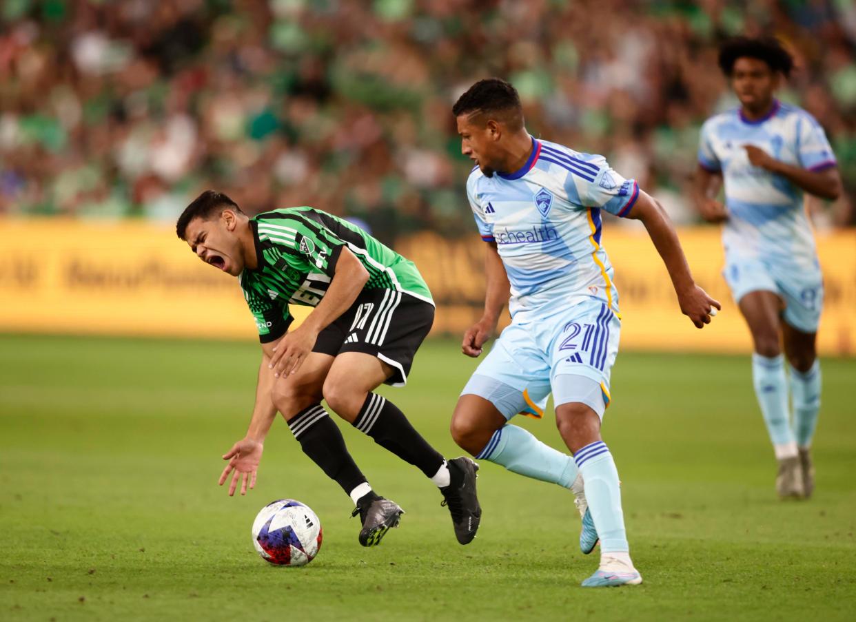 Austin FC forward Rodney Redes, left, battles for control of the ball with Colorado midfielder Bryan Acosta during their March 25 match at Q2 Stadium. El Tree hasn't played since and has spent the past two weeks getting rested and ready for the rest of the season.