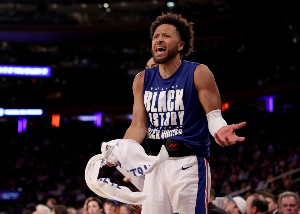 Pistons guard Cade Cunningham reacts from the bench during the second half of the Pistons' 113-111 loss to the Knicks on Monday, Feb. 26, 2024, in New York.