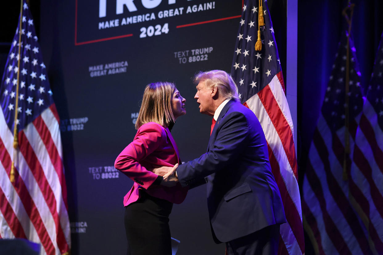 Kim Reynolds; Donald TrumpScott Olson/Getty Images