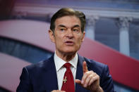 FILE - Mehmet Oz takes part in a forum for Republican candidates for U.S. Senate in Pennsylvania at the Pennsylvania Leadership Conference in Camp Hill, Pa., April 2, 2022. Millionaire candidates and billionaire investors are harnessing their considerable personal wealth to try to win competitive Republican primaries for open U.S. Senate seats in Pennsylvania and Ohio. In Pennsylvania, three multimillionaire candidates, including TV's Dr. Mehmet Oz, report loaning their campaigns over $20 million combined. (AP Photo/Matt Rourke, File)