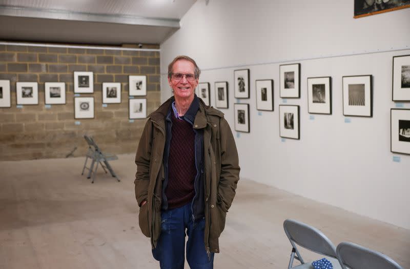 Antony Penrose, son of American photographer and surrealist Lee Miller, poses inside the exhibition of his mothers work, which he curates, at Farleys House & Gallery