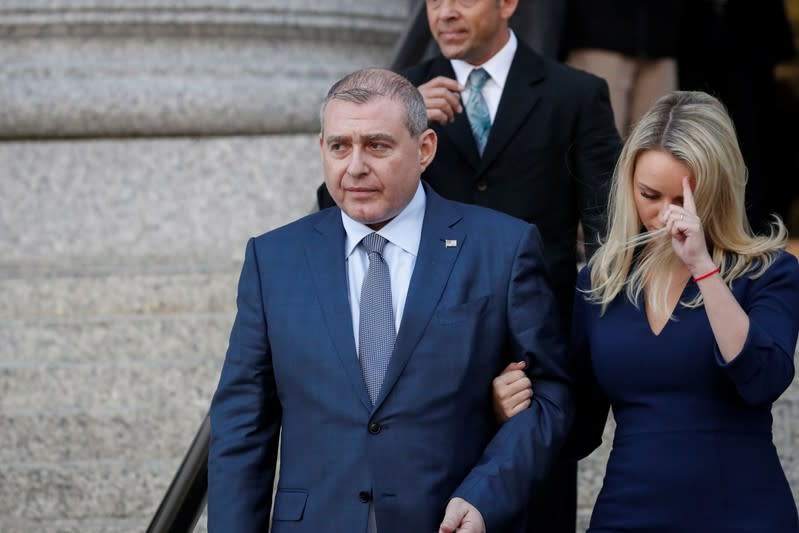 Ukrainian-American businessman Lev Parnas exits following his arraignment at the United States Courthousein New York