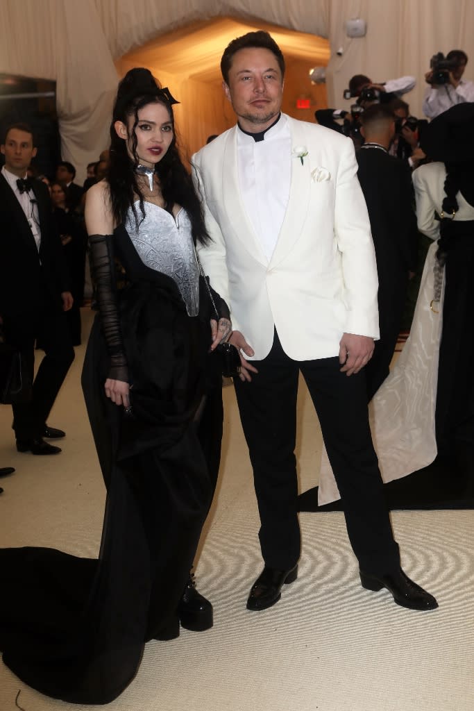 Grimes and Elon Musk attend the 2018 Met Gala in New York City on May 7, 2018. - Credit: SplashNews.com