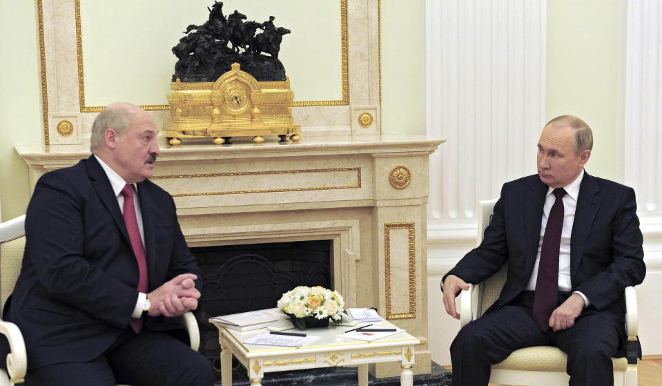 Russian President Vladimir Putin, right, and Belarusian President Alexander Lukashenko talk during their meeting in Moscow, Russia, Thursday, April 22, 2021. (Mikhail Klimentyev, Sputnik, Kremlin Pool Photo via AP)