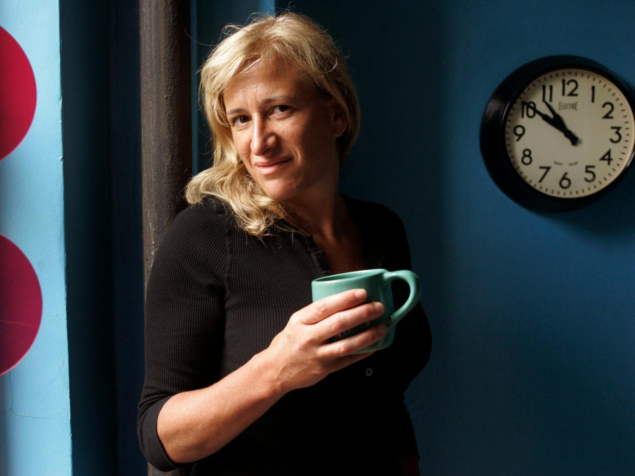 Melissa Bank, author of "The Girls' Guide to Hunting and Fishing," poses in the kitchen of her apartment May 26, 2005, in New York. Bank has just published a follow-up book, "The Wonder Spot."