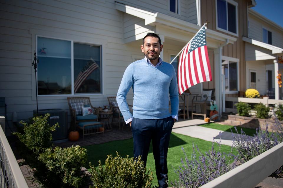 Richard C. Martinez poses for a portrait at his home in Ault on Oct. 5. Martinez works in Fort Collins and attends Colorado State University for a master's degree, but recently bought a townhome in Ault because of the cost of housing in Fort Collins.