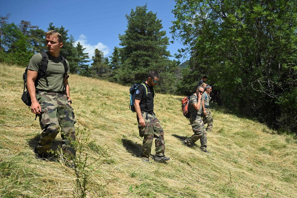 French gendarmes take part in a search operation for two-and-a-half-year-old Emile who is now reported missing for over five days (AFP via Getty Images)