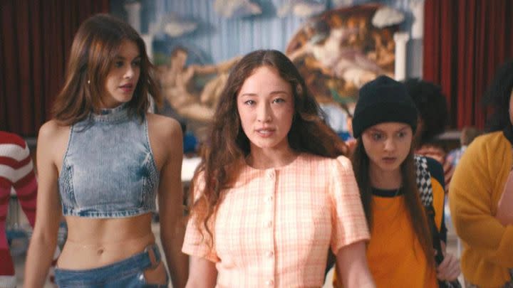 Brittany, Isabel, and Hazel walking down the cafeteria in Bottoms.