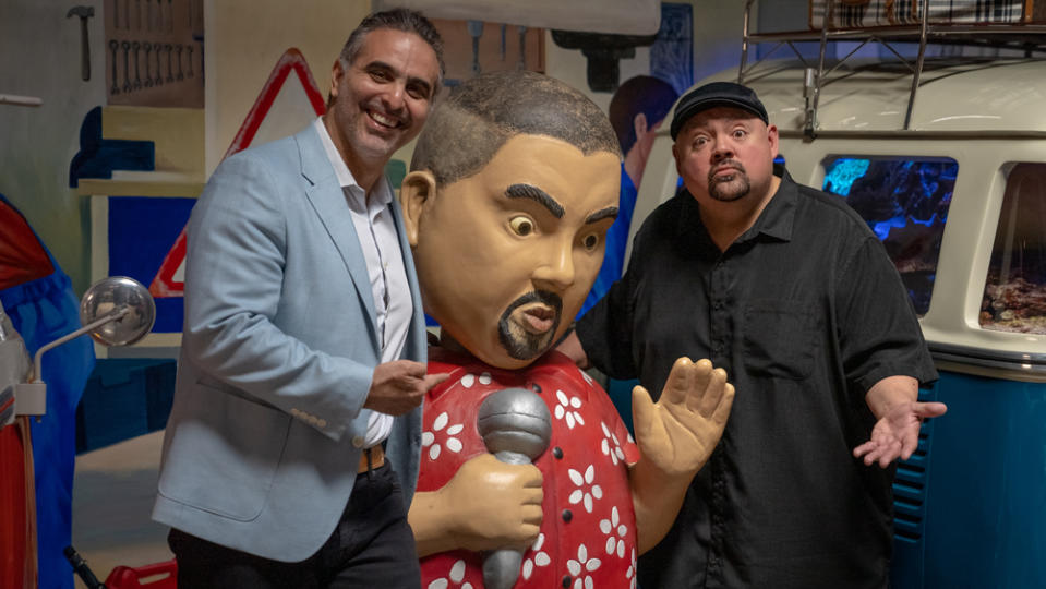 Pablo Di Si, Volkswagen Group of America's president and CEO (left), pays comedian Gabriel Iglesias and his VW collection a visit.
