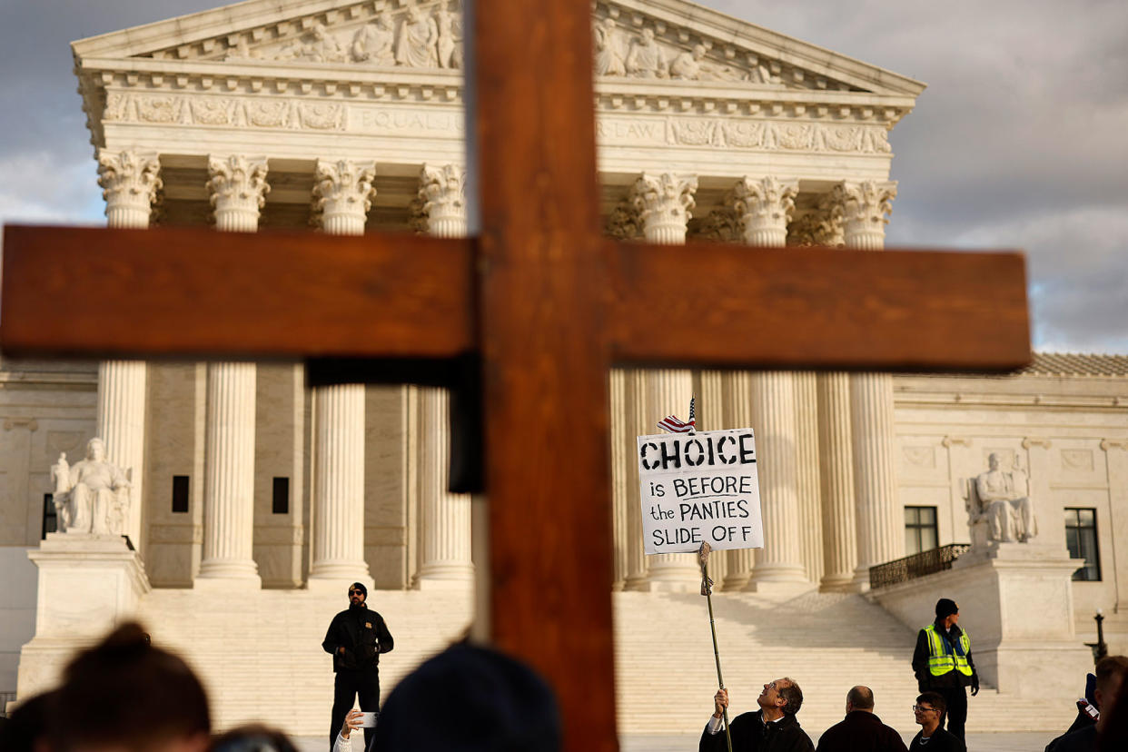 Cross Supreme Court Anti-Abortion Sign Chip Somodevilla/Getty Images