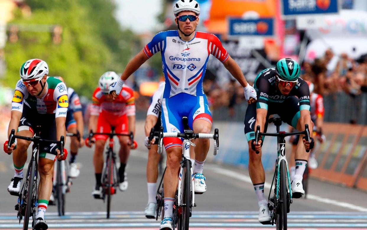 Arnaud Demare won after a crash took down many of his rivals - AFP