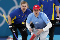 Curling - Pyeongchang 2018 Winter Olympics - Men's Final - Sweden v U.S. - Gangneung Curling Center - Gangneung, South Korea - February 24, 2018 - Second Rasmus Wranaa of Sweden and skip John Shuster of the U.S. watch the shot. REUTERS/John Sibley