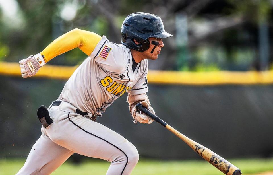 Miami Sunset Knights’s Angel Santiago #2 (SS), runs after hitting a hit in the first inning of a GMAC Tournament game against theFelix Varela Vipers at the Felix Varela Senior High School baseball field in Kendall, on Friday April 14, 2023