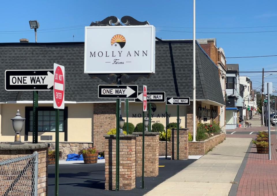 Entrance to Molly Ann Farms on Belmont Avenue, looking north.