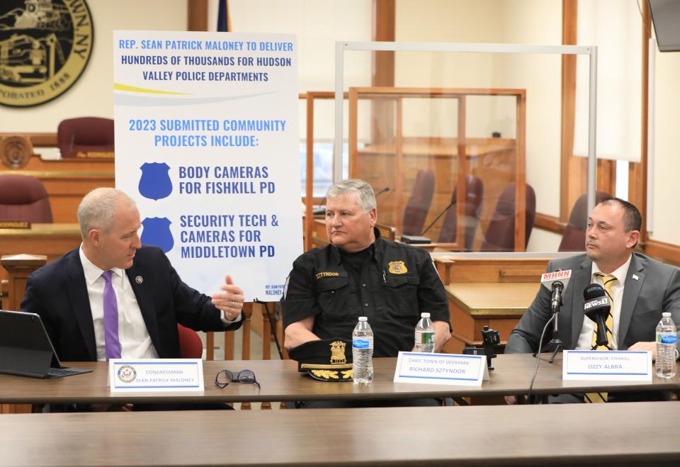 Rep. Sean Patrick Maloney talks with, from left, Town of Deerpark Police Chief Richard J. Sztyndor and Town of Fishkill Supervisor Ozzy Albra during a press conference announcing funding for police body cameras and assorted technologies slated for departments in the Hudson Valley at Middletown City Hall on May 2, 2022. 