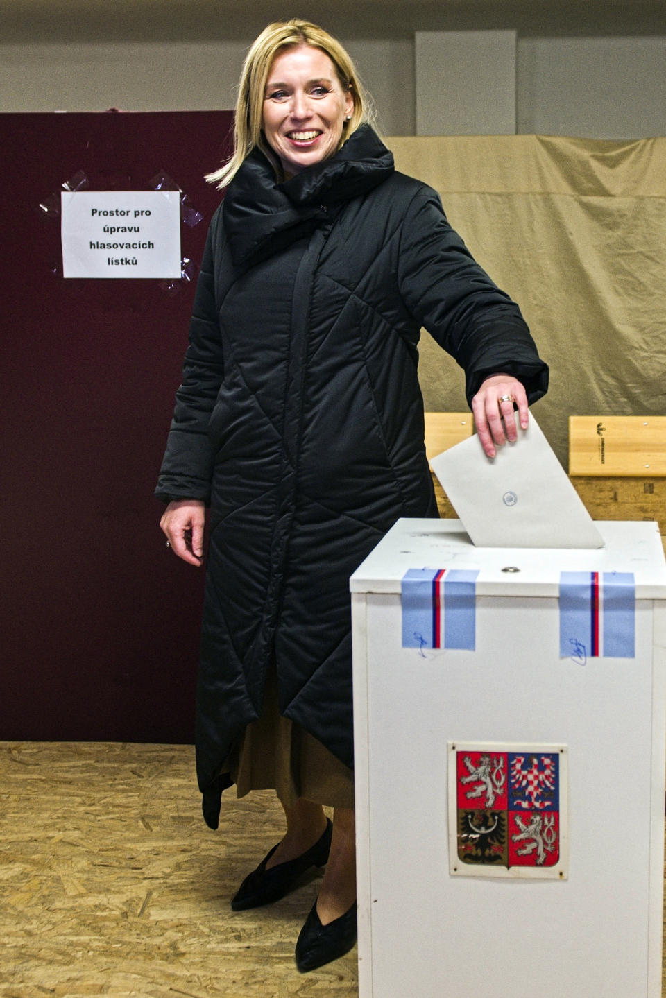 Czech Presidential Candidate Danuse Nerudova casts her vote in the first round of the presidential election, in Kurim, Czech Republic, Friday Jan. 13, 2023. (Patrik Uhlir/CTK via AP)