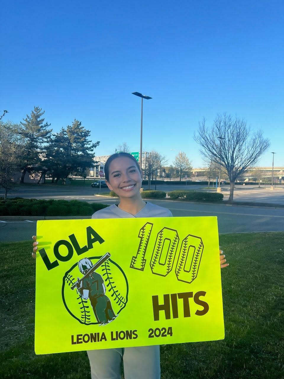 Leonia senior second baseman Lola Fernandez was honored after her 100th career hit for the Lions on Monday.