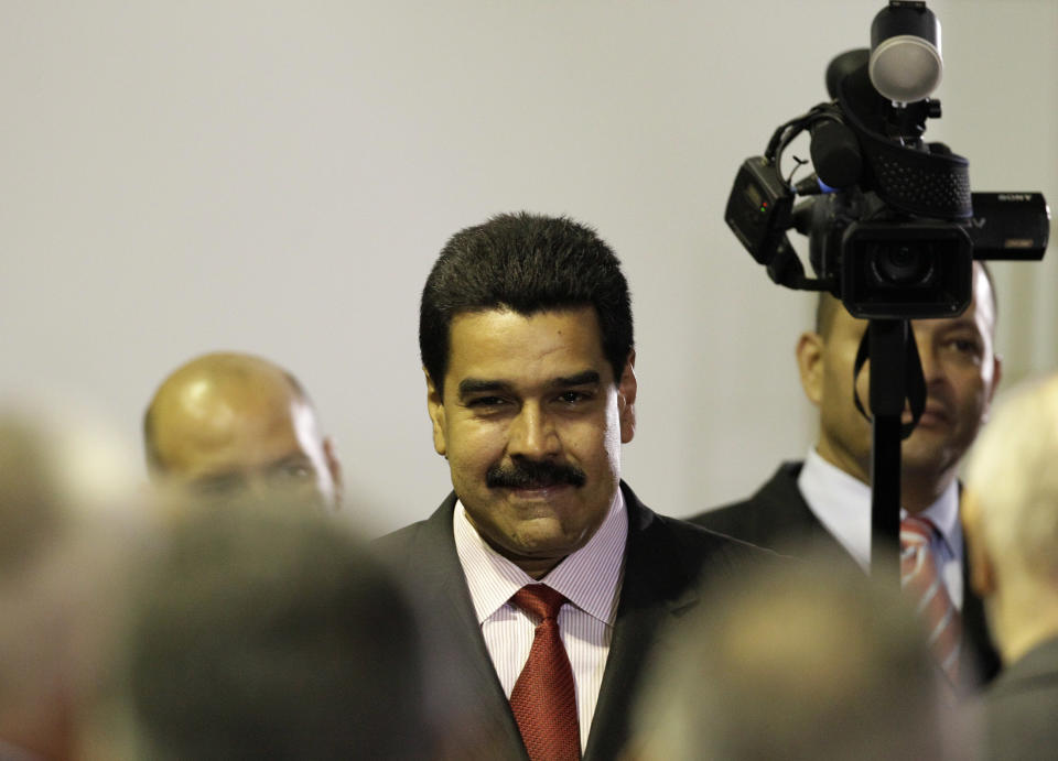 Venezuela's long time Foreign Minster Nicolas Maduro attends a ceremony declaring President Hugo Chavez official winner of Sunday's presidential elections at the Electoral Council in Caracas, Venezuela, Wednesday, Oct. 10, 2012. During the event Chavez announced he was naming Maduro as new vice president. (AP Photo/Ariana Cubillos)