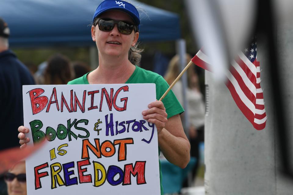 Angie Houlihan joined the dozens gathered in Melbourne to protest against the banning of books Jan. 28.