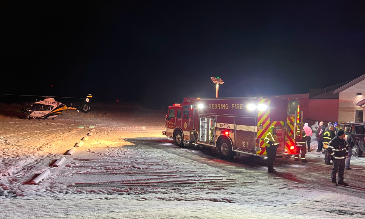 A medical helicopter lands to take a 28-year-old man, who was injured in a crash between a motorized bicycle and a semi on U.S. Route 62 near Sebring, to an Akron hospital on Jan. 23, 2023. The man, who was on the bike, sustained multiple injuries.