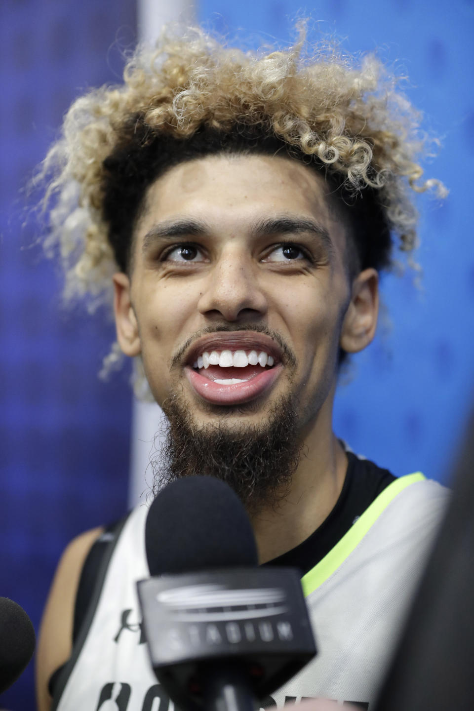 Brian Bowen smiles as he speaks with the media at the NBA draft basketball combine in Chicago, Thursday, May 16, 2019. (AP Photo/Nam Y. Huh)