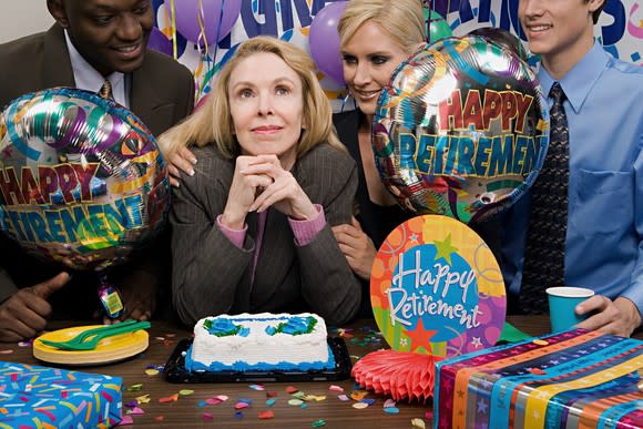 Woman smiling at her retirement party.