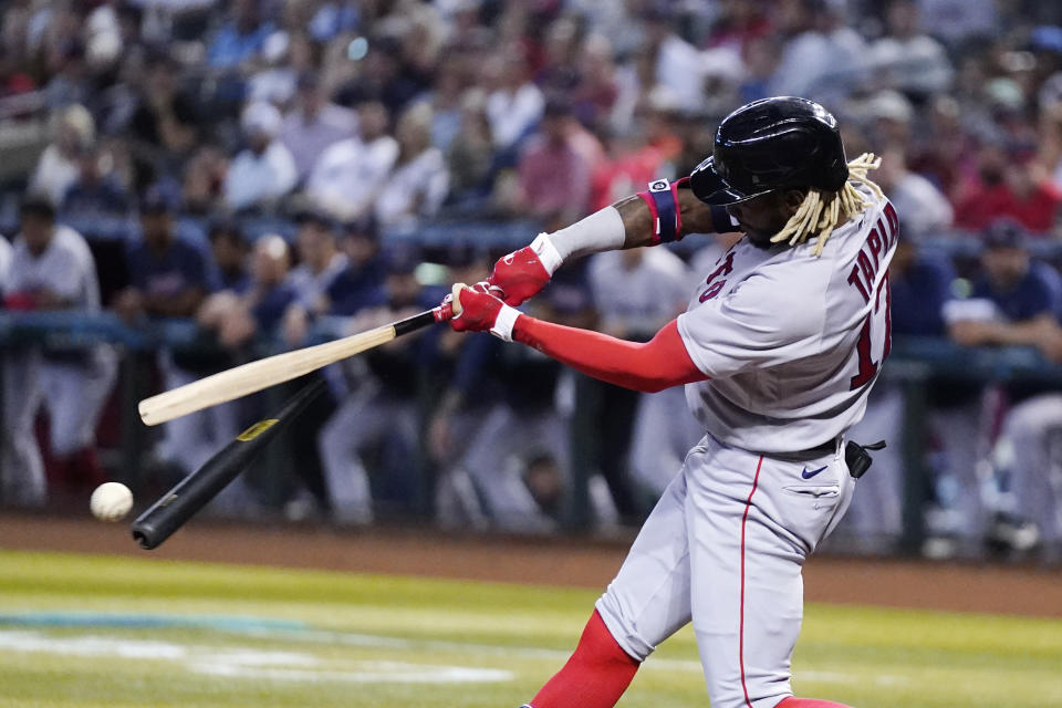 Boston Red Sox's Raimel Tapia breaks his bat on an infield grounder for an out against the Arizona Diamondbacks during the first inning of a baseball game Friday, May 26, 2023, in Phoenix. (AP Photo/Ross D. Franklin)