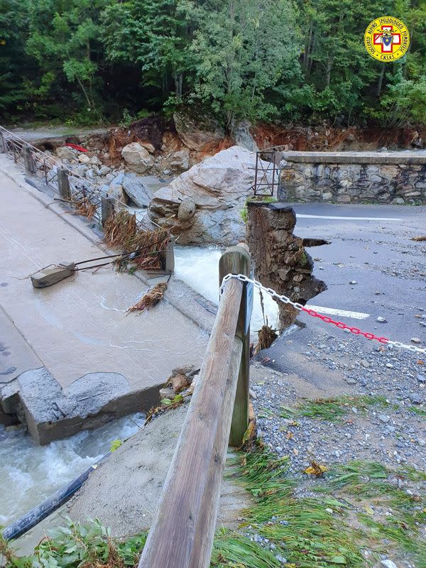 A bridge collapses into a river after flash flooding occurred in Giacomo di Entracque