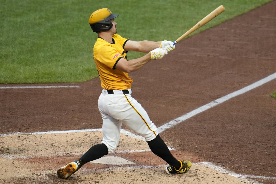 Pittsburgh Pirates' Bryan Reynolds follows through on a two-run home run off New York Mets starting pitcher Luis Severino during the fifth inning of a baseball game in Pittsburgh, Friday, July 5, 2024. (AP Photo/Gene J. Puskar)