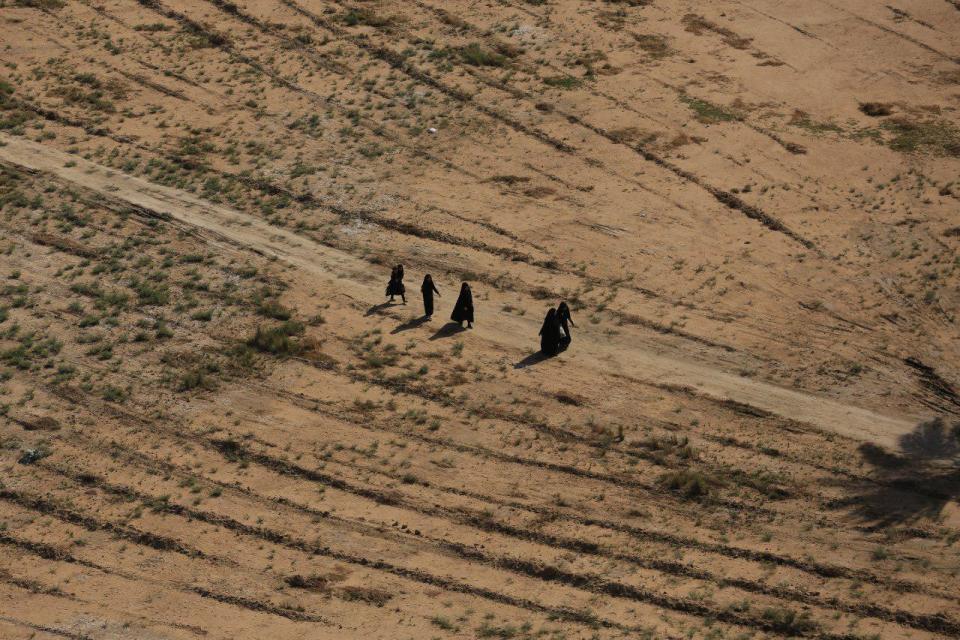 Shiite pilgrims march to their holy shrines for Arbaeen, outside Karbala, Iraq on Monday, Oct. 29, 2018. The annual commemoration, called Arbaeen, brings more pilgrims each year than the Hajj, in Saudi Arabia, yet it is hardly known outside Islam. (AP Photo/Hadi Mizban)