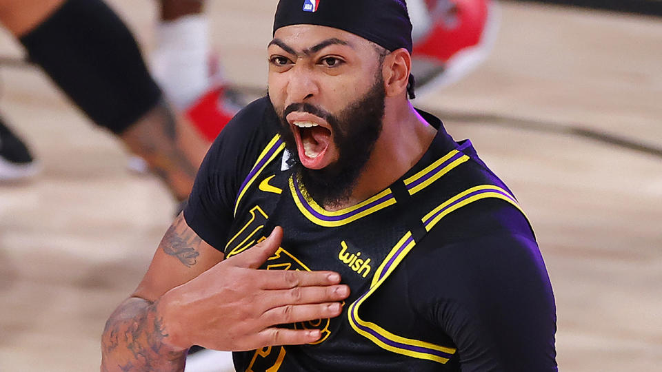 Anthony Davis celebrates after his buzzer beating three-pointer won the game for the Lakers against the Denver Nuggets in the NBA's Western Conference Finals. (Photo by Kevin C. Cox/Getty Images)