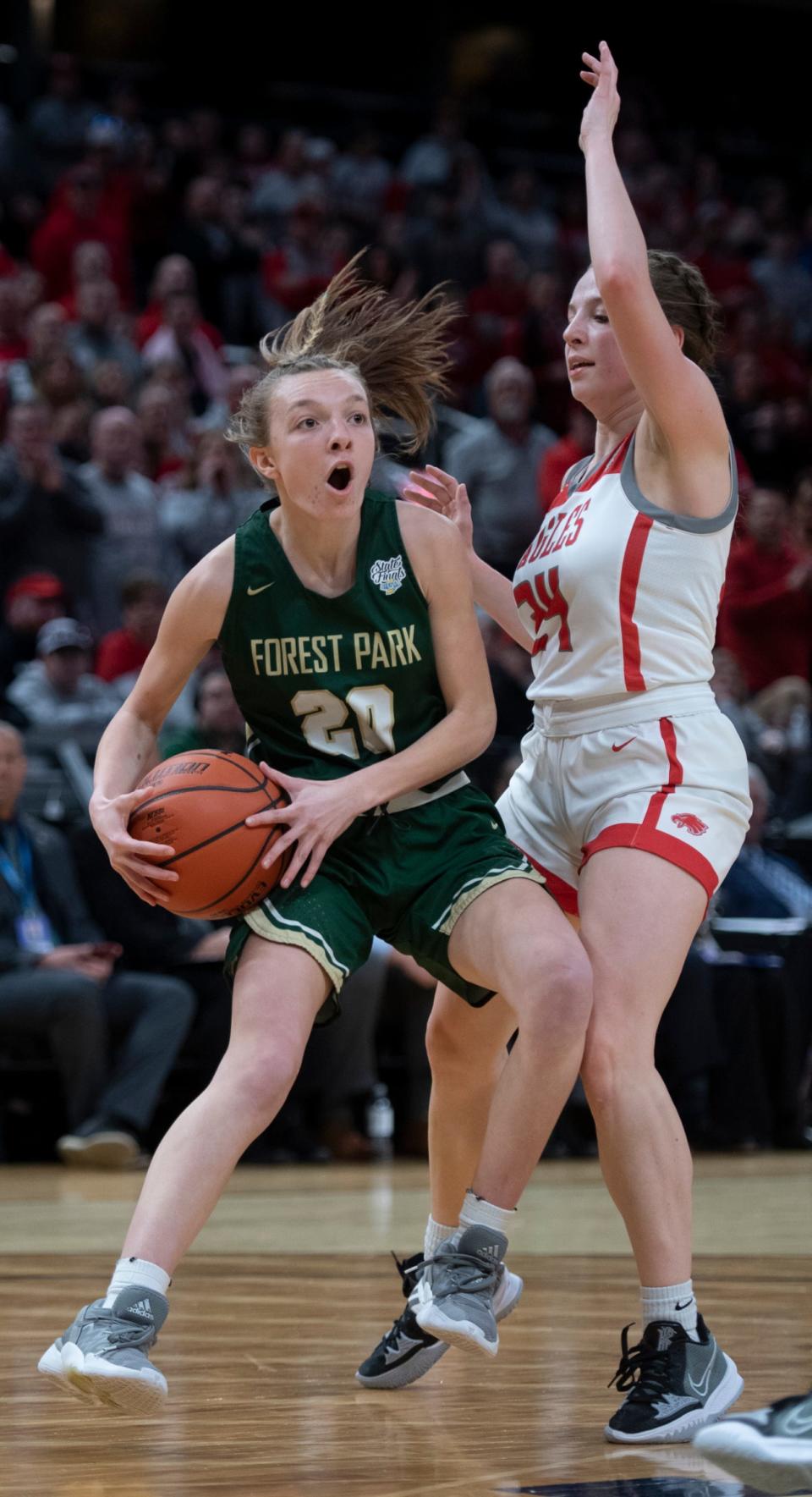 Forest Park's Danielle Eckert (20) looks to pass around Frankton's Bailee Webb (24) during the IHSAA girls basketball Class 2A state championship at Gainbridge Fieldhouse in Indianapolis, Ind., Saturday afternoon, Feb. 26, 2022.