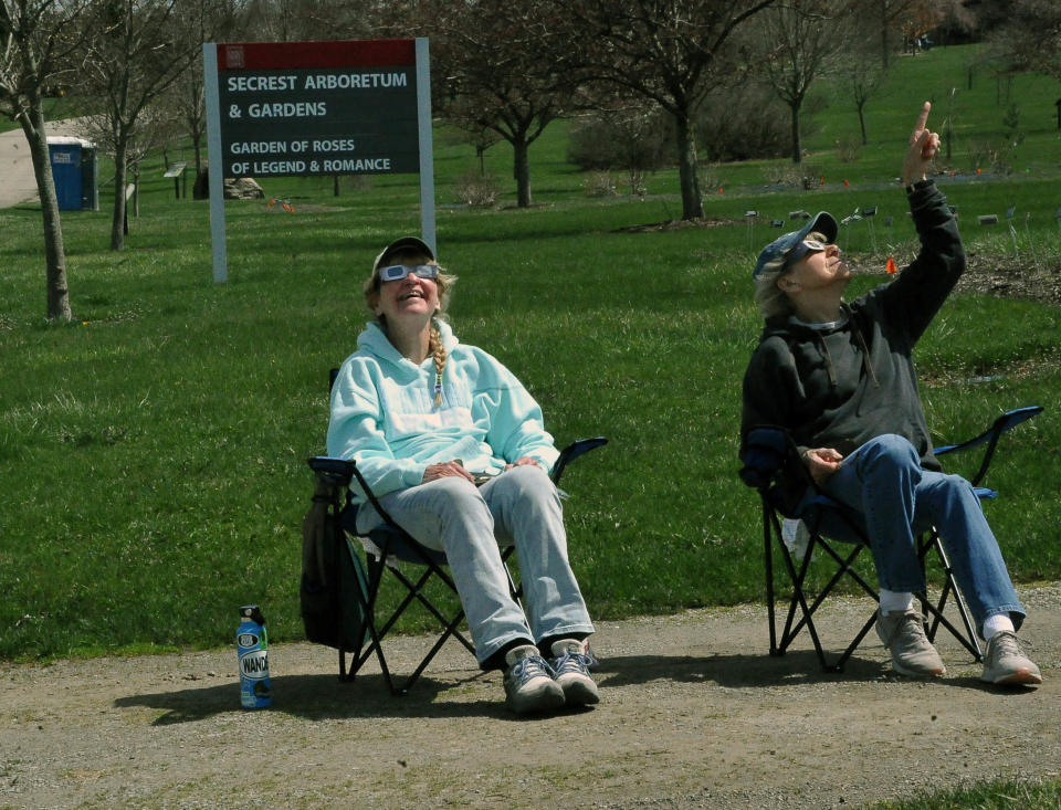 Liz Stewart and Bertie Showers of Wooster found a quiet place to watch the solar eclipse at the Secrest Arboretum on the OARDC campus.