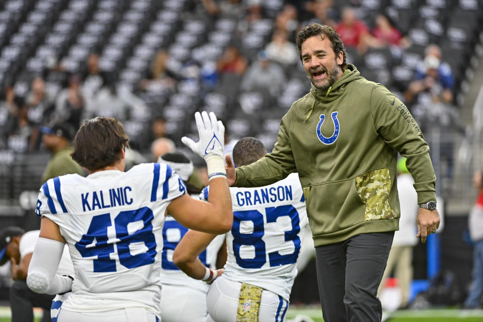 Indianapolis Colts interim head coach Jeff Saturday greets tight end Nikola Kalinic before an NFL football game against the Las Vegas Raiders in Las Vegas, Sunday, Nov. 13, 2022. (AP Photo/David Becker)