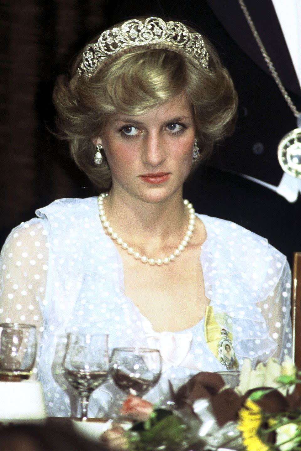 <p>With a more blown-out hairstyle and a diamond tiara at an event while visiting New Zealand. </p>