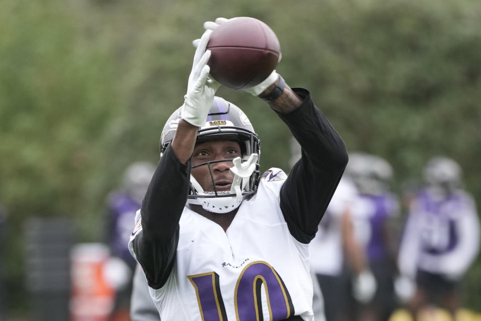 Baltimore Ravens cornerback Arthur Maulet (10) attends an NFL practice session in London, Thursday, Oct. 12, 2023 ahead the NFL game against Tennessee Titans at the Tottenham Hotspur Stadium on Sunday. (AP Photo/Kin Cheung)