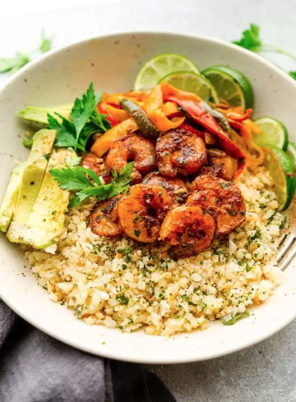 <p>Life Made Sweeter</p><p>Chili lime shrimp fajita cauliflower rice bowls are the perfect healthy meal for spring or summer. Best of all, they’re low carb, paleo, Whole30, keto-friendly and easy to customize and made with cauliflower rice, bell peppers and avocado.</p><p><strong>Get the recipe: <a href="https://lifemadesweeter.com/chili-lime-shrimp-fajita-bowls/" rel="nofollow noopener" target="_blank" data-ylk="slk:Chili Lime Shrimp Fajita Cauliflower Rice Bowls;elm:context_link;itc:0;sec:content-canvas" class="link rapid-noclick-resp">Chili Lime Shrimp Fajita Cauliflower Rice Bowls</a></strong></p>