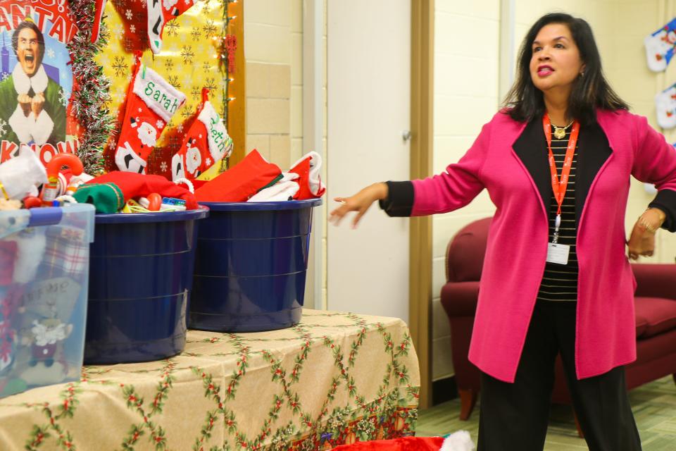 Lynda Ramirez, a lead social worker with Corpus Christi ISD, thanks Third Coast Church for the donation of 105 stockings for district students Tuesday, Dec. 7, 2021.