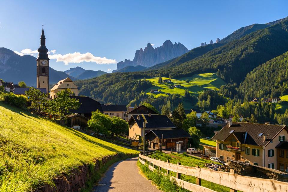sunrise scene of landscape of italian alp the dolomites with chiesa parrocchiale di san pietro in funes valley, south tyrol, italy