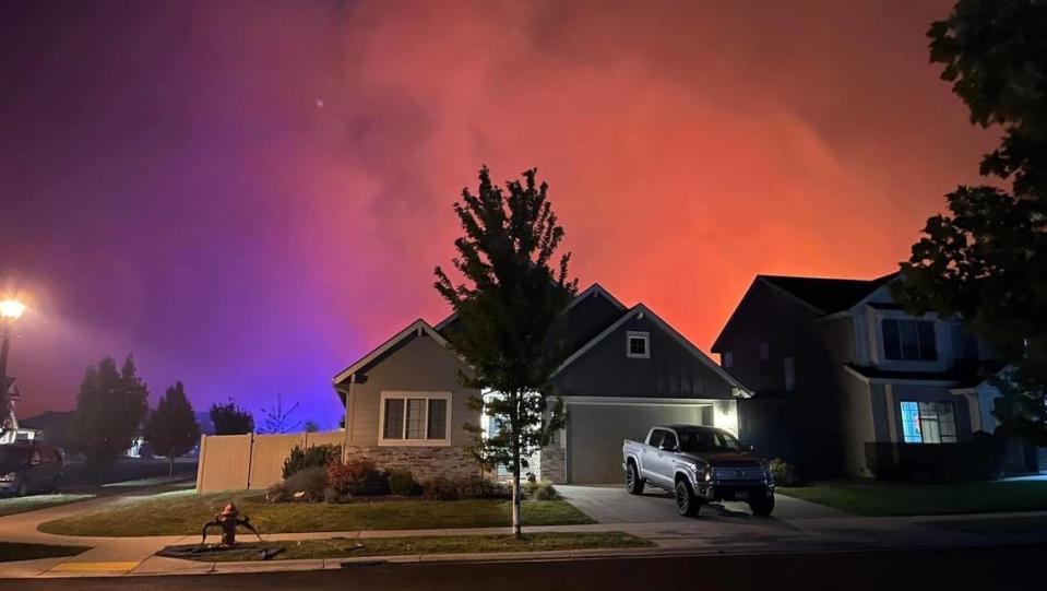 The Camp family evacuated their Southeast Boise home Thursday morning after a nearby brush fire grew quickly overnight.