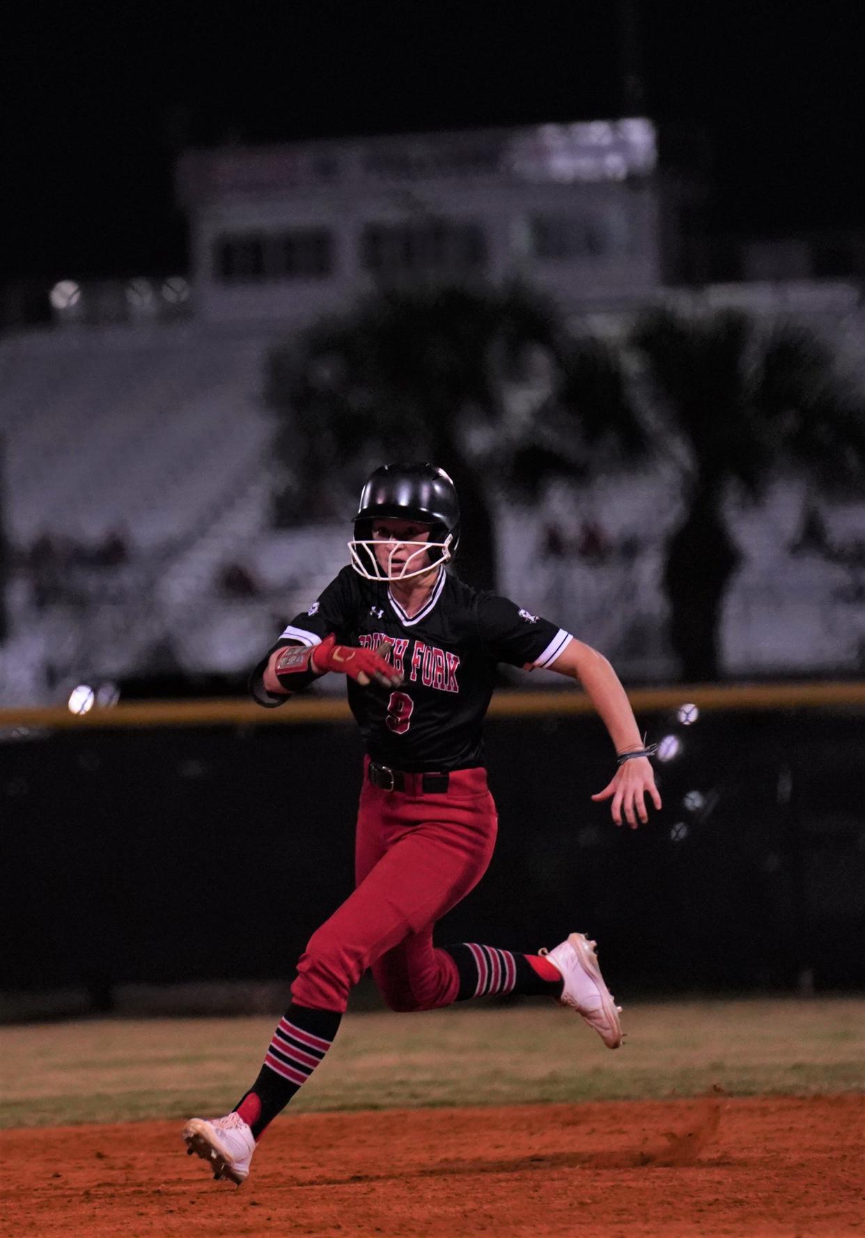 South Fork's Alice Dewaters races to third base after a triple in the fourth inning against Jensen Beach in a high school softball game on Friday, Feb. 24, 2023 in Jensen Beach. The Bulldogs won 8-5.