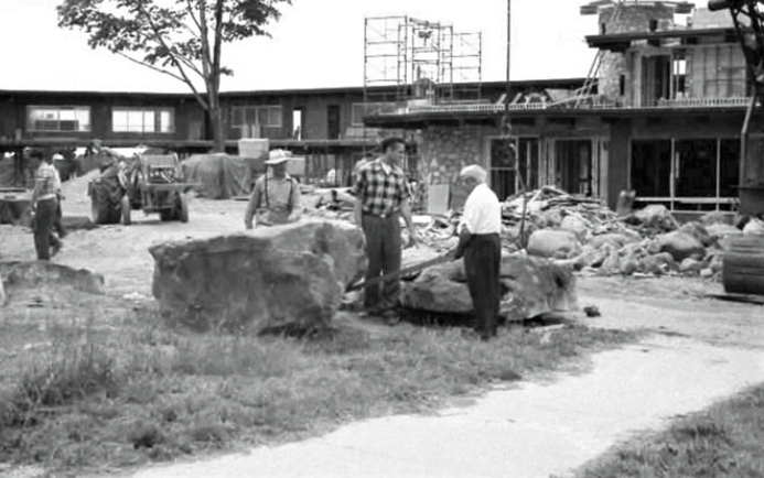 Charlevoix architect Earl Young (far right) built the original hotel called the "Weathervane Lodge" in 1959.