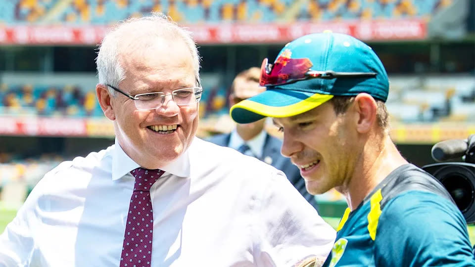 Tim Paine is seen here chatting to Australian Prime Minister Scott Morrison.