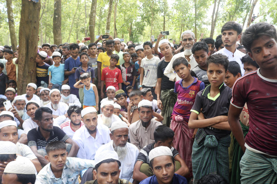 Rohingya refugees gather to mark the fifth anniversary of their exodus from Myanmar to Bangladesh, at a Kutupalong Rohingya refugee camp at Ukhiya in Cox's Bazar district, Bangladesh, Thursday, Aug. 25, 2022. Hundreds of thousands of Rohingya refugees on Thursday marked the fifth anniversary of their exodus from Myanmar to Bangladesh, while the United States, European Union and other Western nations pledged to continue supporting the refugees' pursuit of justice in international courts.(AP Photo/ Shafiqur Rahman)