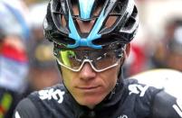 Team Sky rider Chris Froome of Britain waits for start of the 189.5-km (117.7 miles) 5th stage of the 102nd Tour de France cycling race from Arras to Amiens, France, July 8, 2015. REUTERS/Benoit Tessier